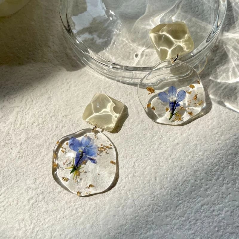 boucles d'oreilles en fleurs séchées bleues
